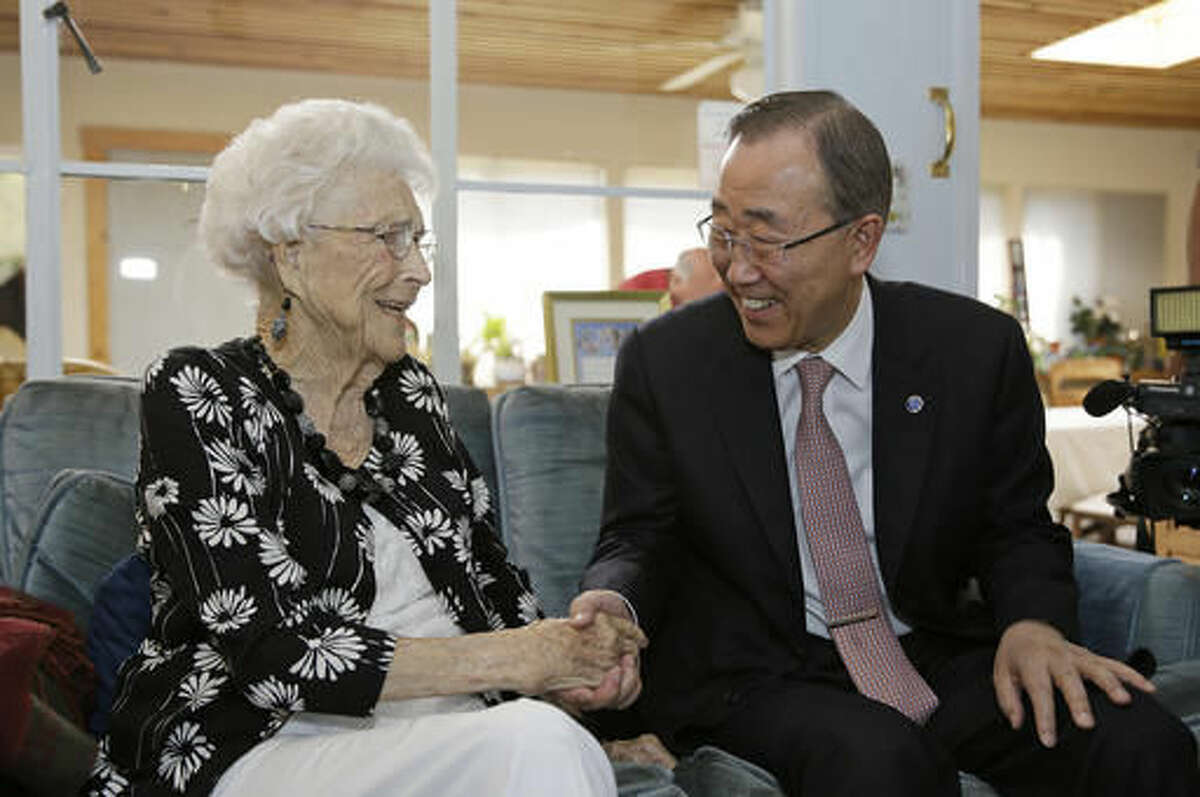 U.N. Secretary-General Ban Ki-moon visits with his 99-year-old "American Mom" Libba Patterson before lunch at her home Thursday, Aug. 11, 2016, in Novato, Calif. The two became acquainted when Patterson and her family hosted the future UN chief on his first trip to the United States, when he was 18. Patterson had tears in her eyes when she spoke about how the teenage "Ki-moon" became her fourth child and part of her family during his eight-day visit in 1962. When Ban is on the west coast he tries to visit Patterson at her home north of San Francisco. (AP Photo/Eric Risberg)
