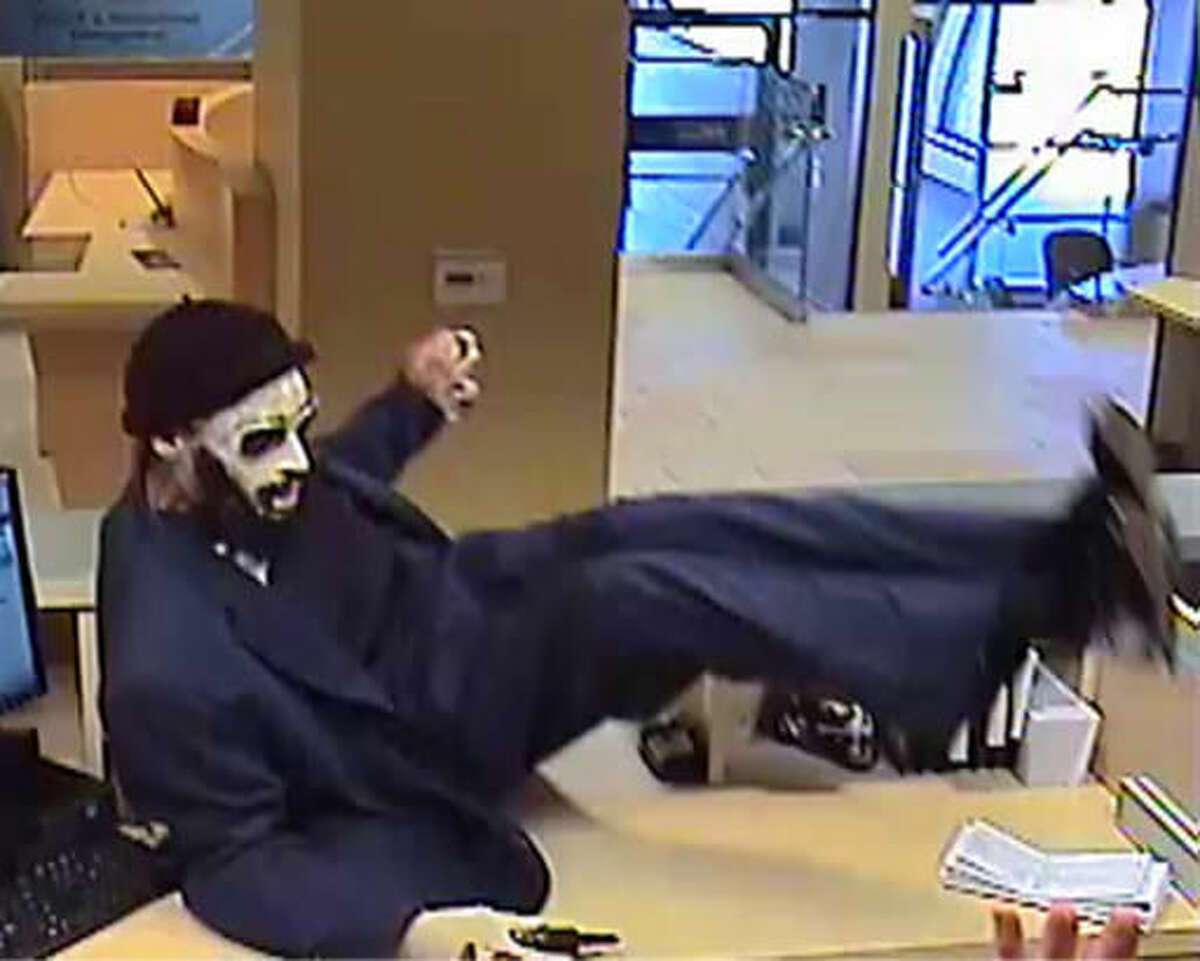 Police Dreaded Bandit Is Recently Paroled Bank Robber