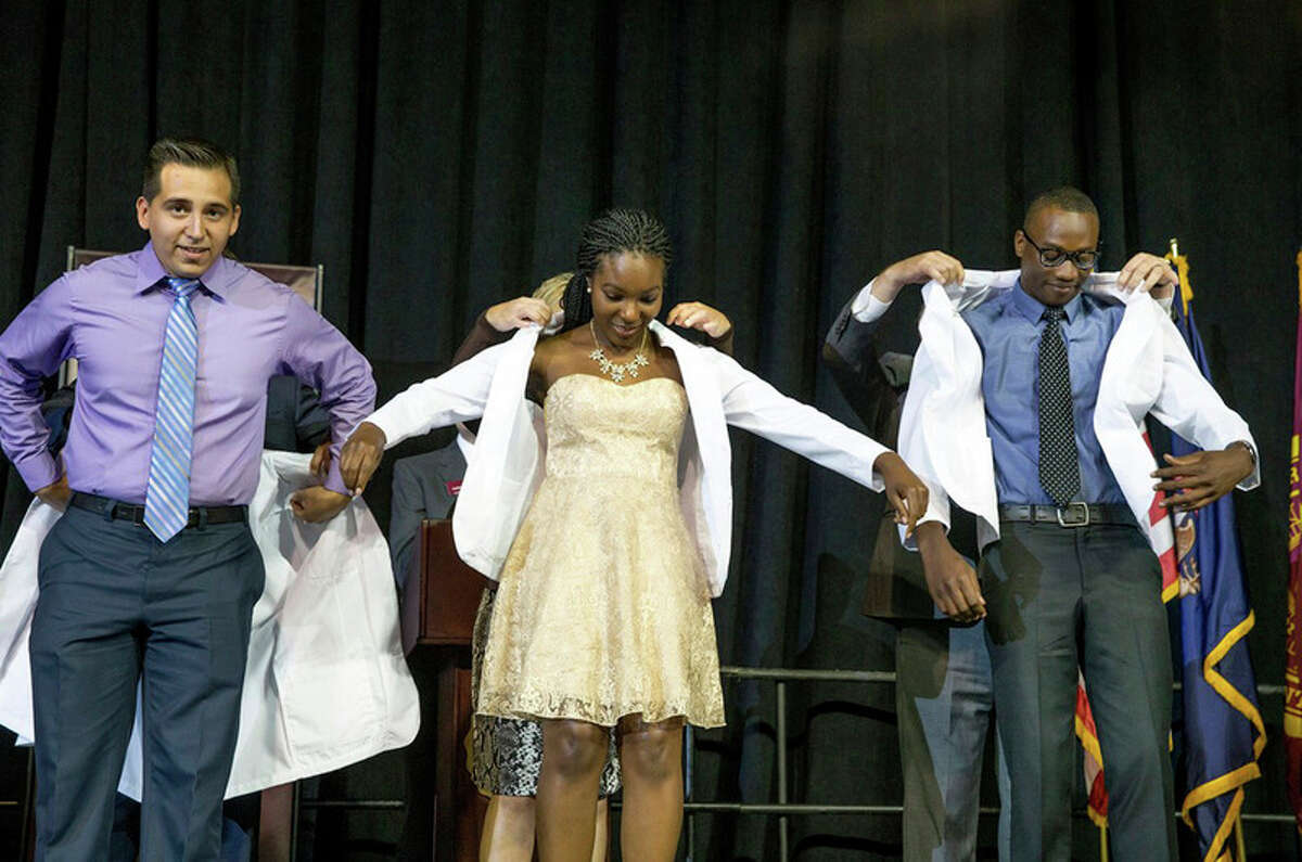 The fourth class of Central Michigan University's College of Medicine arrived on campus Monday, Aug. 1, and spent the first week in orientation. The week concluded with them receiving their white coats and reciting the Hippocratic Oath they wrote at a ceremony Friday afternoon.