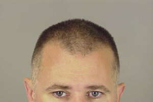 Michael Jon Gelagotis is being held at the Jefferson County jail on accusations that he impersonated a police officer.