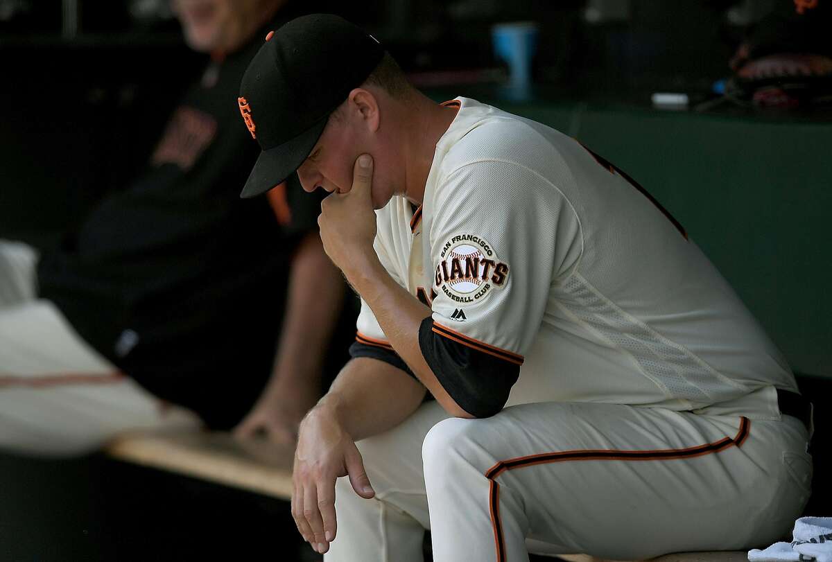 Pitcher Matt Cain of the San Francisco Giants sits in the dugout after he was taken out of the game against the Pittsburgh Pirates in the top of the fifth inning at AT&T Park on Aug. 17 in San Francisco.