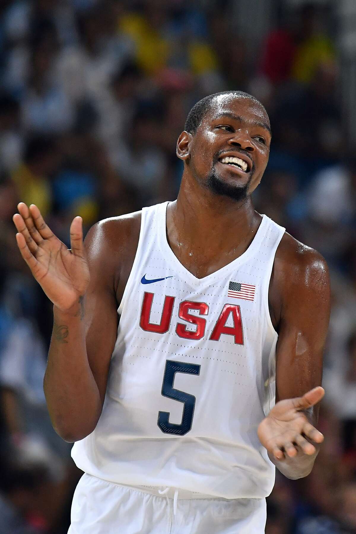 USA's guard Kevin Durant reacts during a Men's quarterfinal basketball match between USA and Argentina at the Carioca Arena 1 in Rio de Janeiro on August 17, 2016 during the Rio 2016 Olympic Games. / AFP PHOTO / Andrej ISAKOVICANDREJ ISAKOVIC/AFP/Getty Images