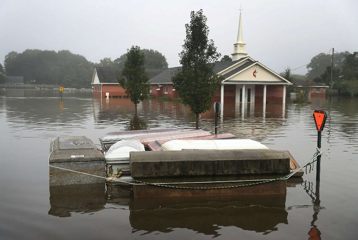 Death toll Louisiana floods: 13 Katrina: 1,833