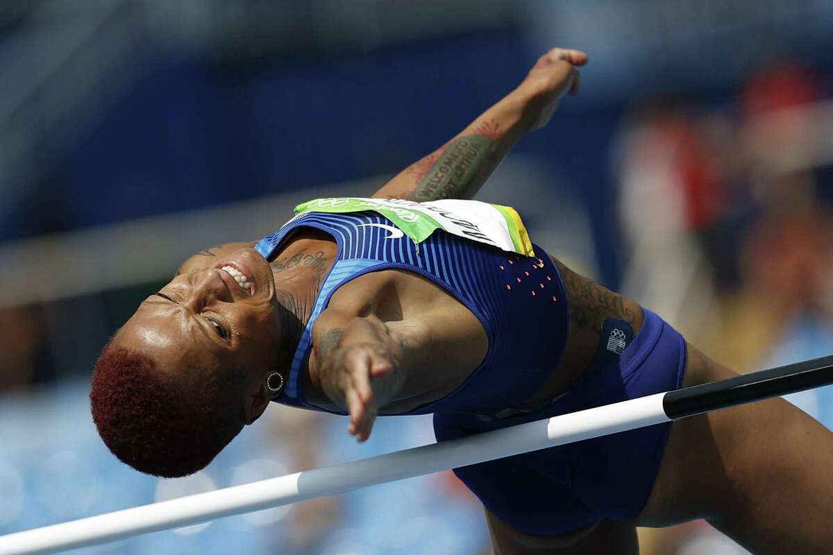 USA's Inika Mcpherson competes in the Women's High Jump Qualifying Round during the athletics event at the Rio 2016 Olympic Games at the Olympic Stadium in Rio de Janeiro on August 18, 2016. / AFP PHOTO / Adrian DENNISADRIAN DENNIS/AFP/Getty Images