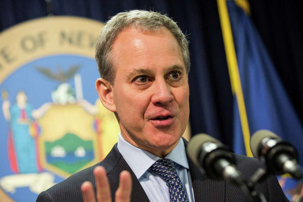 File - New York State Attorney General Eric Schneiderman speaks at a press conference on March 30, 2015 in New York City. (Photo by Andrew Burton/Getty Images)