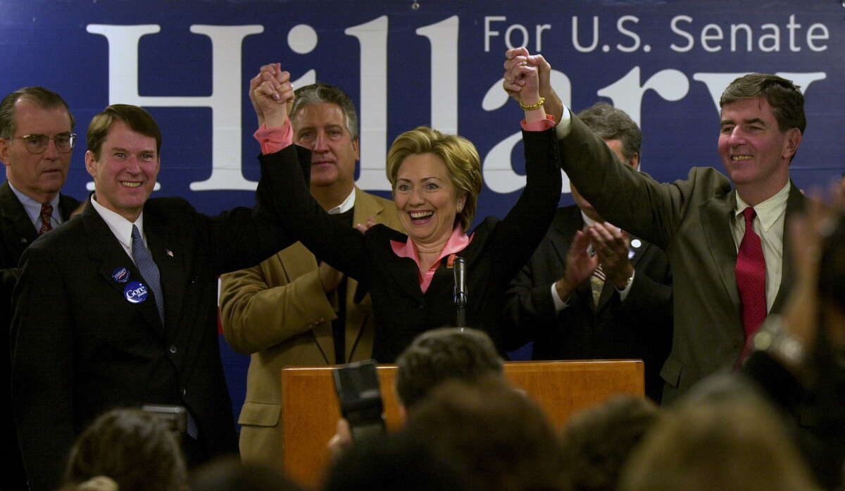 Senator-elect Hillary Clinton made a stop at Albany International Airport to thank her supporters for her election to the U.S. Senate on Nov. 10, 2000, in Colonie, N.Y. Standing behind her are; Albany County Executive Mike Breslin, left, Congressman Mike McNulty, second from left, Albany Mayor Jerry Jennings, center, and State Senator Neil Breslin, right. (Skip Dickstein/ Times Union archive)
