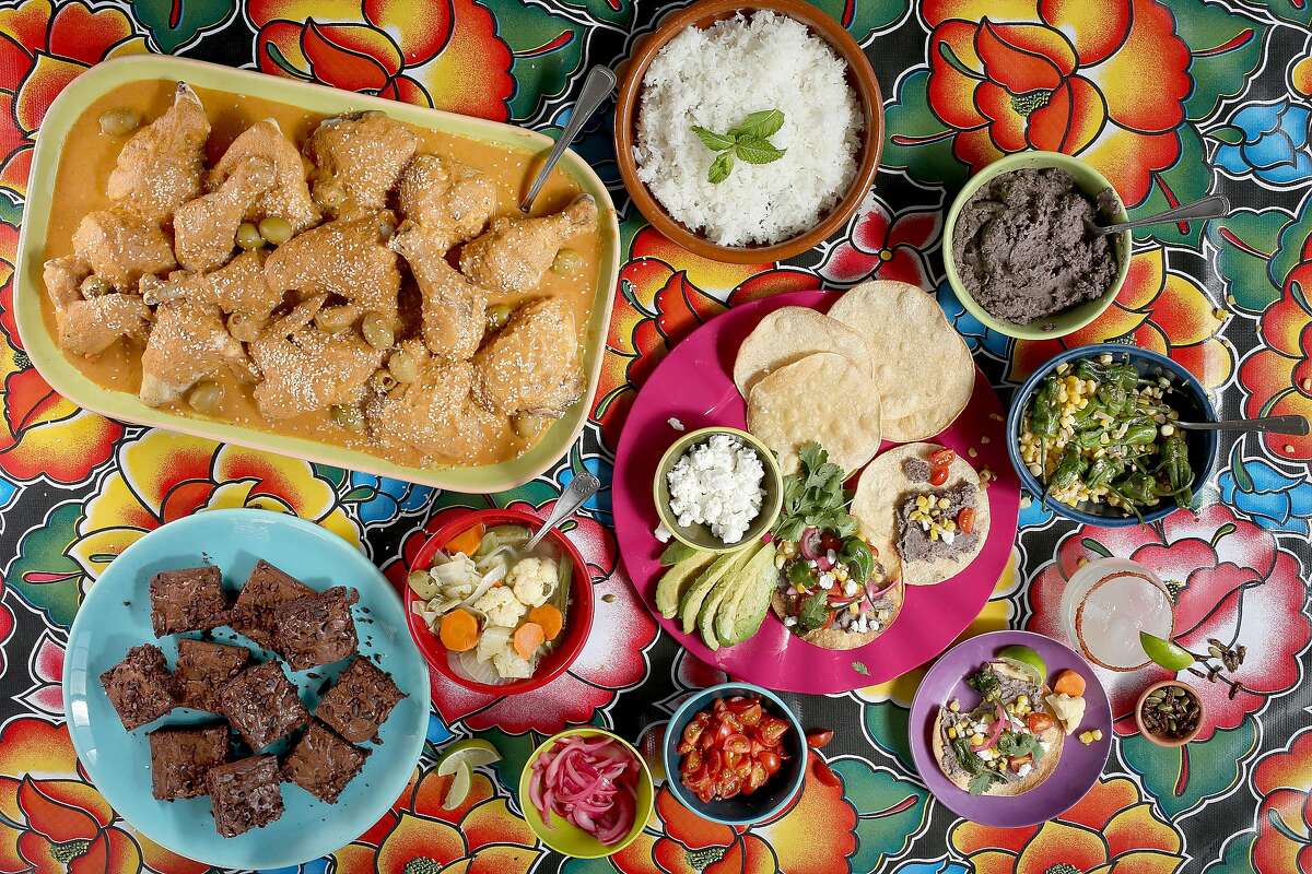 Oaxacan inspired dishes including tlayudas, chicken estofado, mescal margarita, Mexican chocolate brownies, chile-lime crickets and pumpkin seeds, and escabeche on Wednesday, August 17, 2016, in San Francisco, Calif.