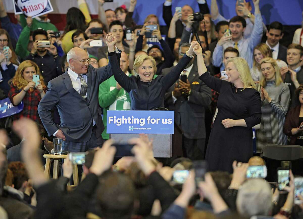The crowd cheers as Congressman Paul Tonko, presidential candidate Hillary Clinton and United States Senator Kirsten Gillibrand hold up their hands at the end of a campaign rally at Cohoes High School on Monday, April 4, 2016 in Cohoes, N.Y. (Lori Van Buren / Times Union)