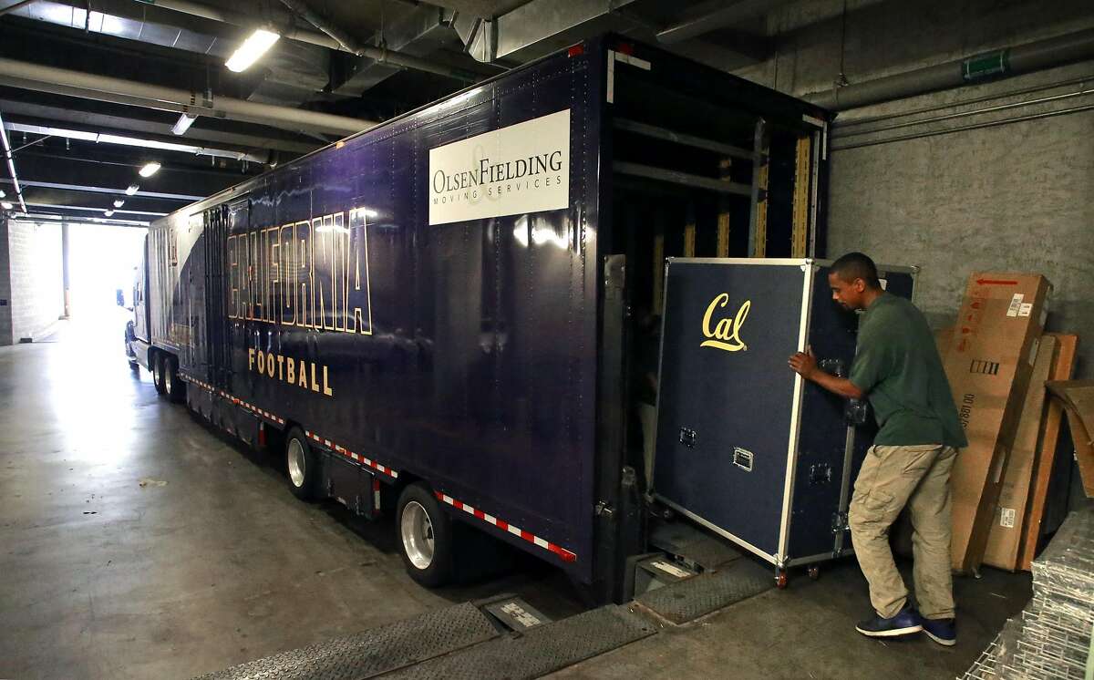 Mover LaVaughn loads trunks full of equipment into a semi trailer at Memorial Stadium in Berkeley, California, on Fri. Aug. 19, 2016, as the California Golden Bears football program prepares for their trip to Sydney Australia for their game against Hawaii next week.