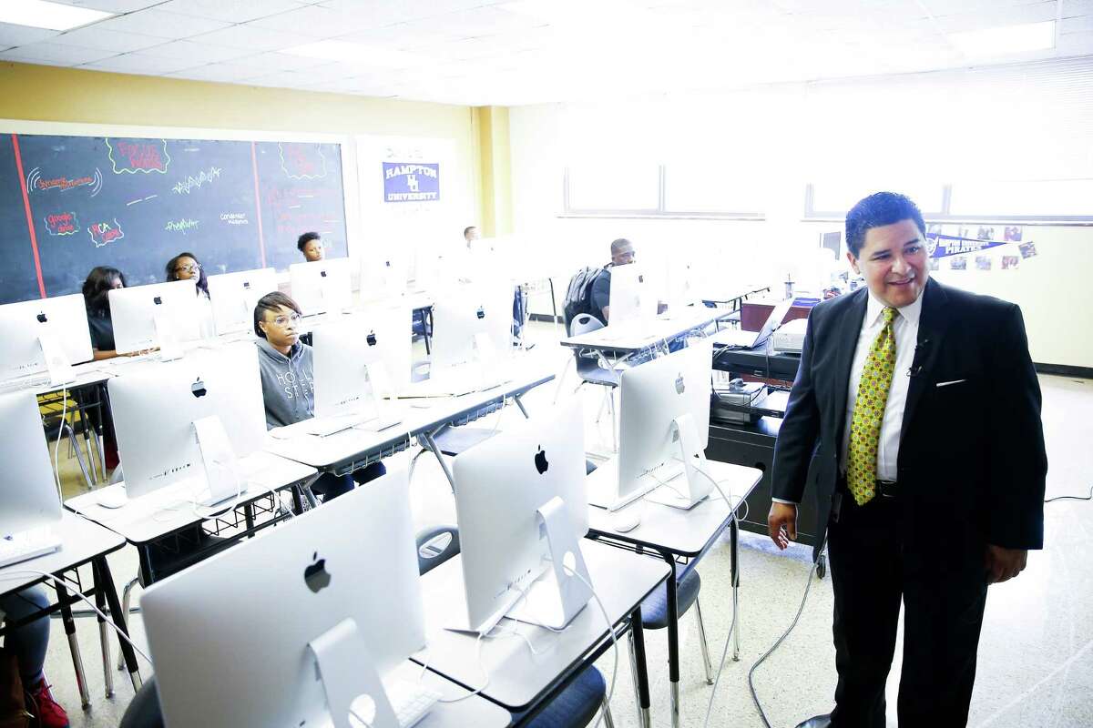 New Houston Independent School District Superintendent Richard Carranza gets a tour of a communications class at Yates High School as he visits schools around the district for the first day of school Monday, August 22, 2016 in Houston.