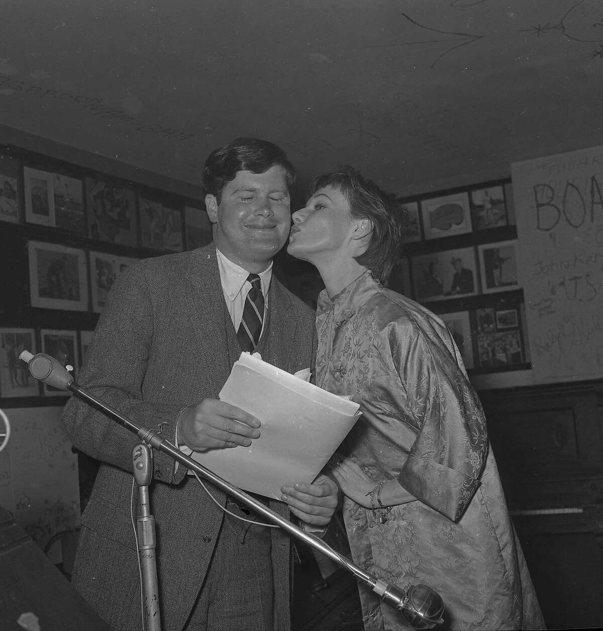 Warren Hinckle, kissed by Charlotte Fairchild, during his run for Supervisor Photo taken August 29, 1961