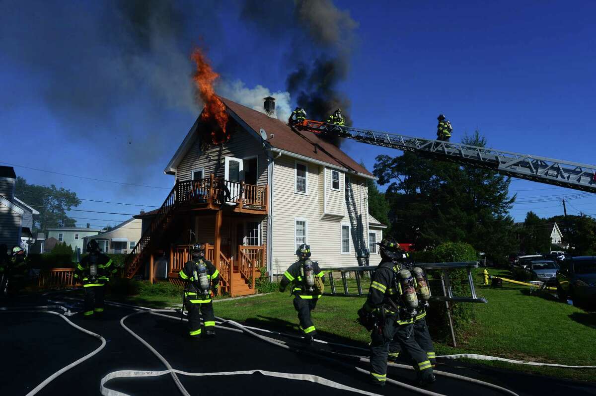 Firefighters battle East Norwalk house fire