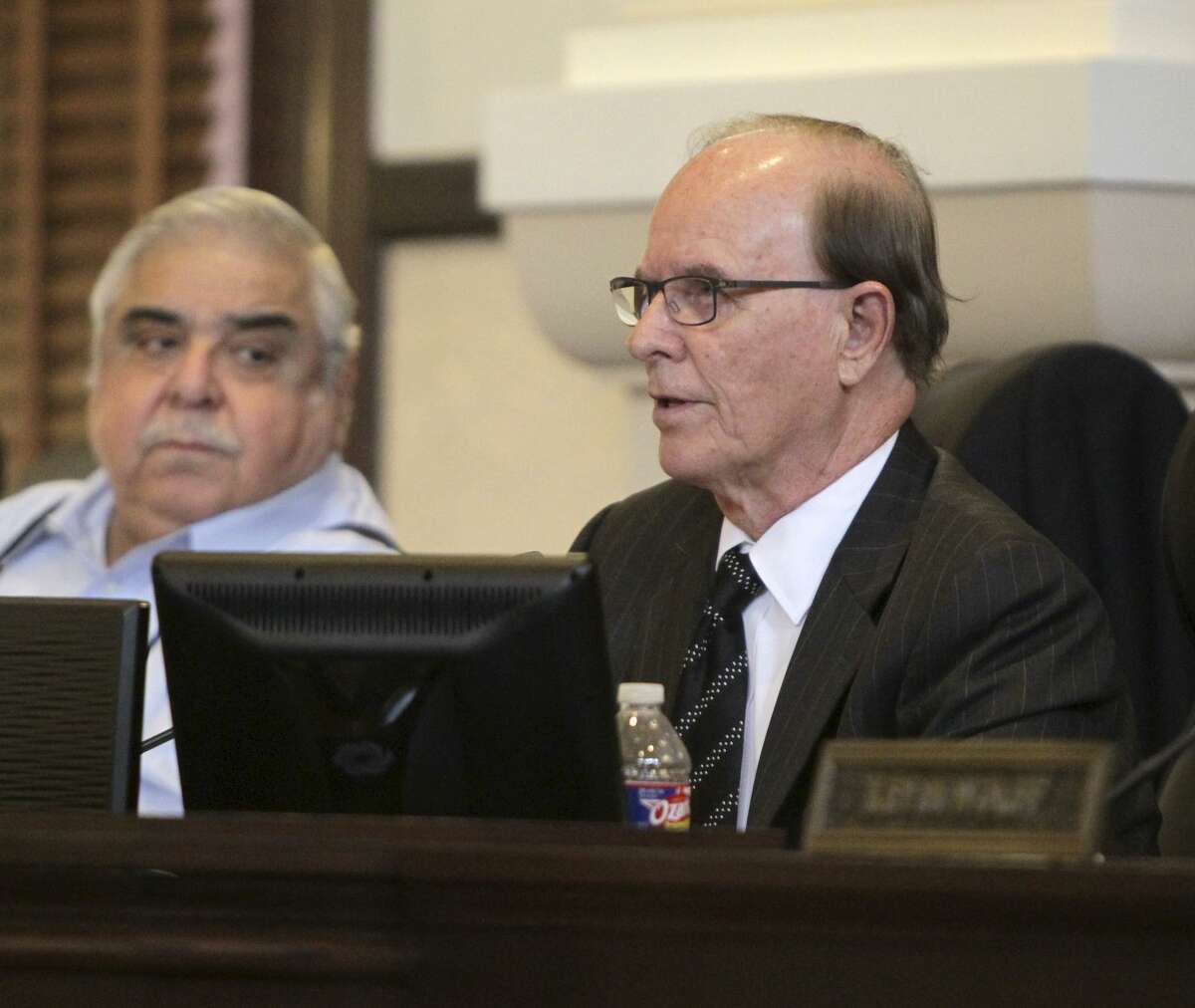 Bexar County commissioners Tuesday unanimously approved a $1.7 billion budget for the next fiscal year. County Judge Nelson Wolff and Commissioner Paul Elizondo are shown at a 2015 meeting.