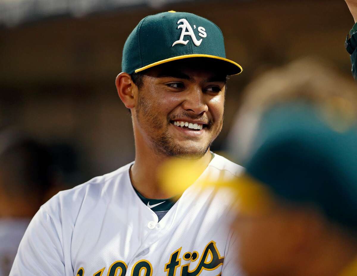 Oakland Athletics' starting pitcher Sean Manaea smiles after leaving game after 7 innings against Cleveland Indians' during MLB game at Oakland Coliseum in Oakland, Calif., on Tuesday, August 23, 2016.