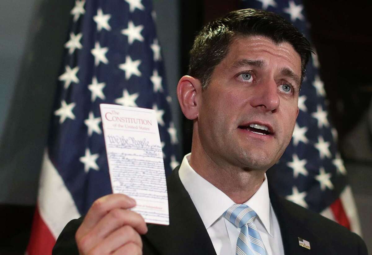 WASHINGTON, DC - JULY 06: U.S. Speaker of the House Rep. Paul Ryan (R-WI) holds up a copy of the U.S. Constitution during a press briefing after a House Republican Conference meeting July 6, 2016 at the headquarters of Republican National Committee in Washington, DC. (Photo by Alex Wong/Getty Images)