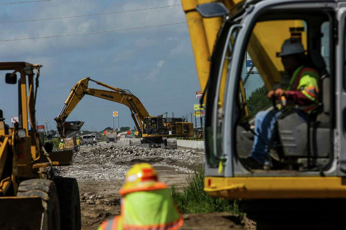 Crews work to widen U.S. 59 in Fort Bend County on Aug. 23 in Rosenberg. The $418.2 million project adds a third lane in each direction to Wharton County, though the entire project isn't expected to open for nearly four years.