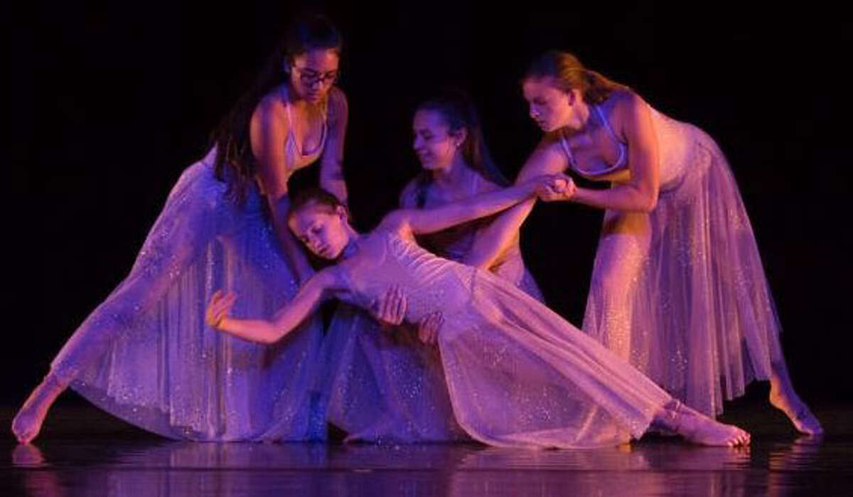 Studio D in New Milford recently presented its productions of ”Mary Poppins ~in Motion” and ”Fairy Tales~A Twist of Fate ~in Motion” at New Milford High School. Dancers, from left to right, Madigan Sotelo, Samantha Hawley, Sydney Santos and Katie Hawley, who are from Studio D’s Modern 4 class perform to Sia‘s ”I Got To Sleep” as part of the ”Fairy Tales” production.