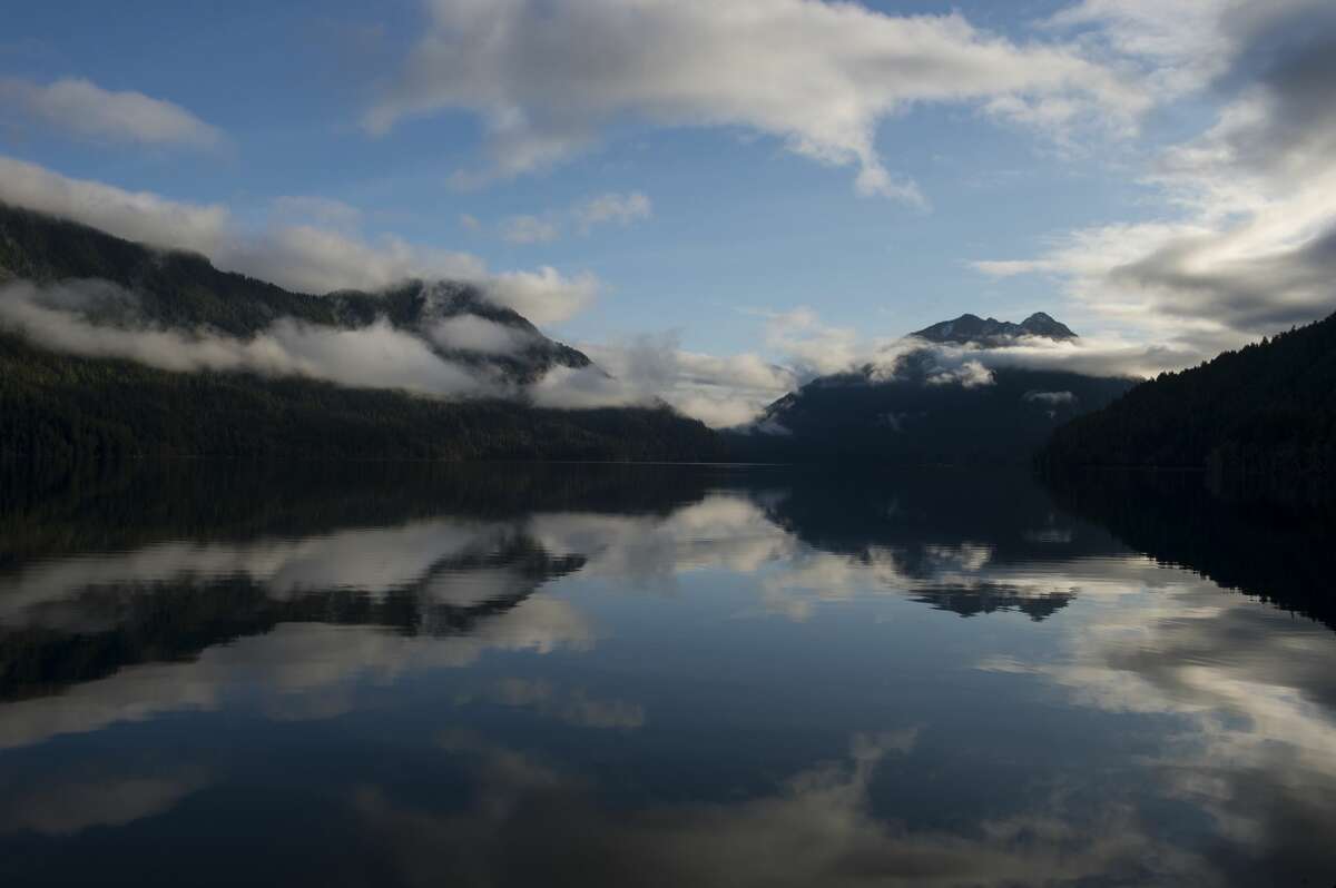 Fog clearing at Lake Crescent, Olympic National Park. (Photo by Wolfgang Kaehler/LightRocket via Getty Images)