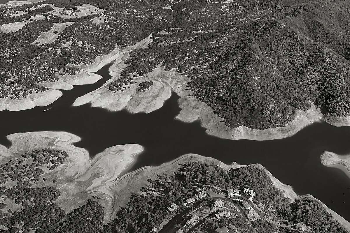 This 2015 photograph, "Aerial Documentation XXI: American River, South Fork, Near Folsom," is one of many landscape images by the Canary Project on view in its Art/Act exhibtion at the Brower Center in Berkeley.