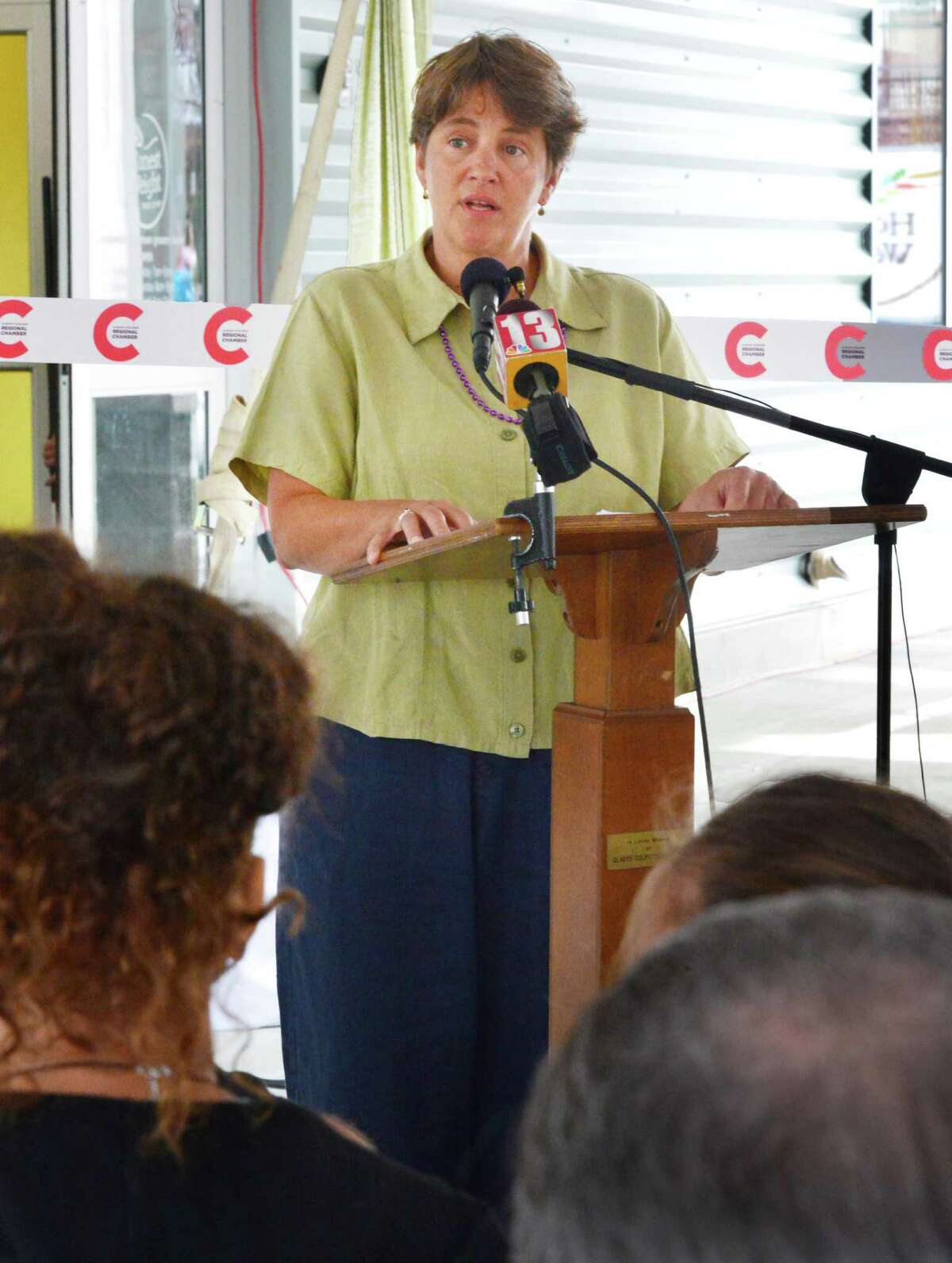 HWFC board president Lynne Lekakis speaks during grand opening ceremonies for Honest Weight Co-Op's new store on Watervliet Ave. Thursday Aug. 8, 2013, in Albany, NY. (John Carl D'Annibale / Times Union)