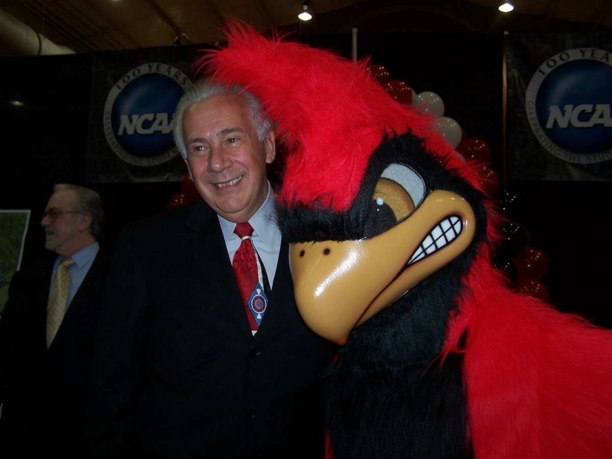 Dr. Lou Agnese and Red the Cardinal pose for the camera. The Cardinal replaced the Crusaders as UIW?•s mascot in 2004.