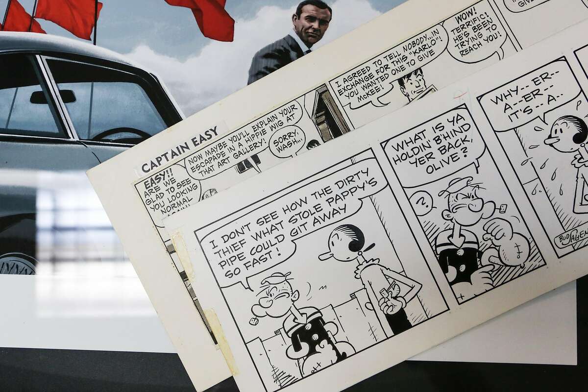 Two recent donations, a Popeye and Captian Easy comic strip, will be part of the permanent collection at the new location of the Cartoon Art Museum. The comic strips are on top of a rare James Bond print, 1 of only 50, that was also recently donated to the Museum.