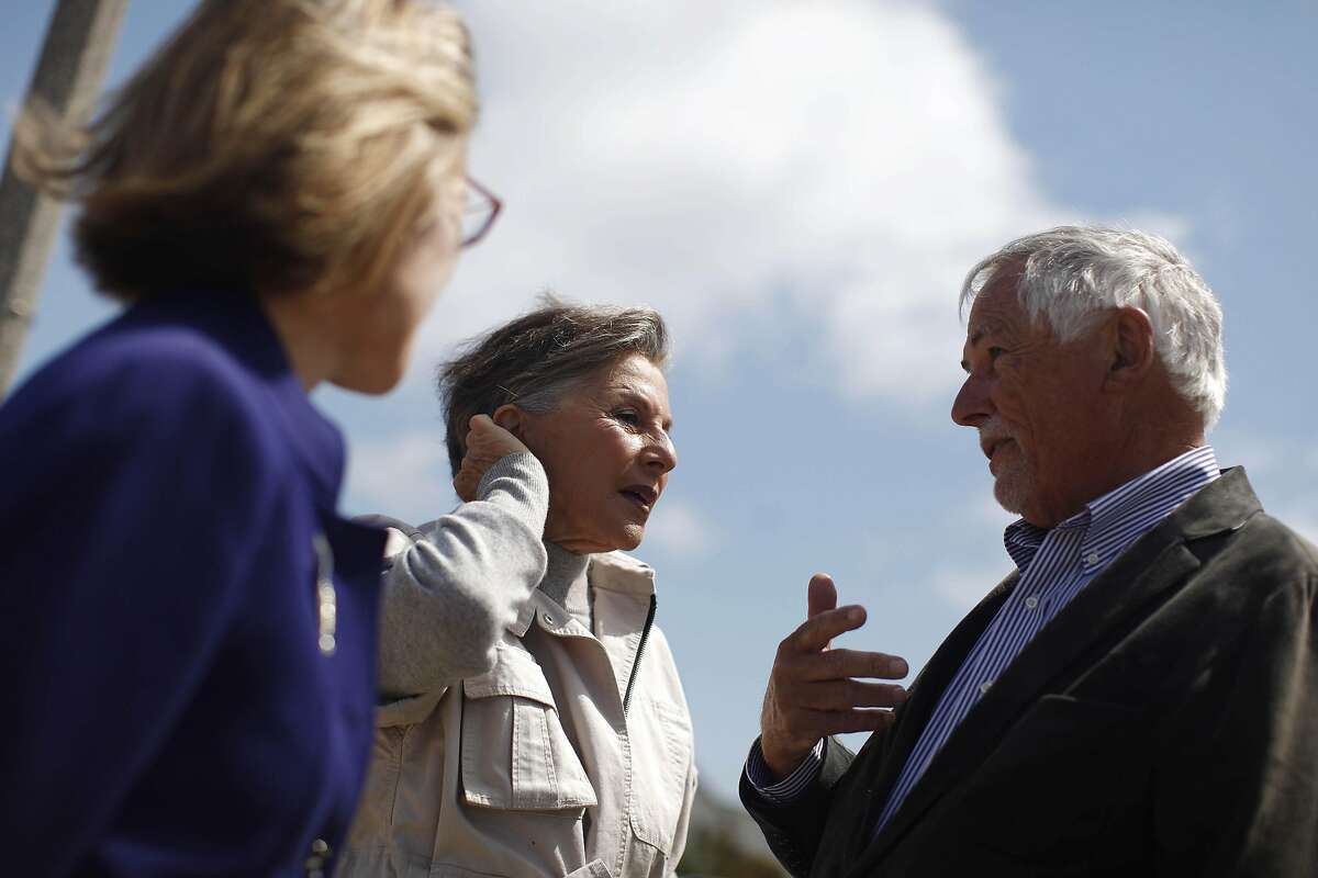 Senator Barbara Boxer (center) talks with Mark Buell(left), head of Park and Recreation and Jean Fraser (left), CEO Presidio Trust, during a press event at the future site of the Presidio Tunnel Tops on Friday, August 26, 2016 in San Francisco, California.