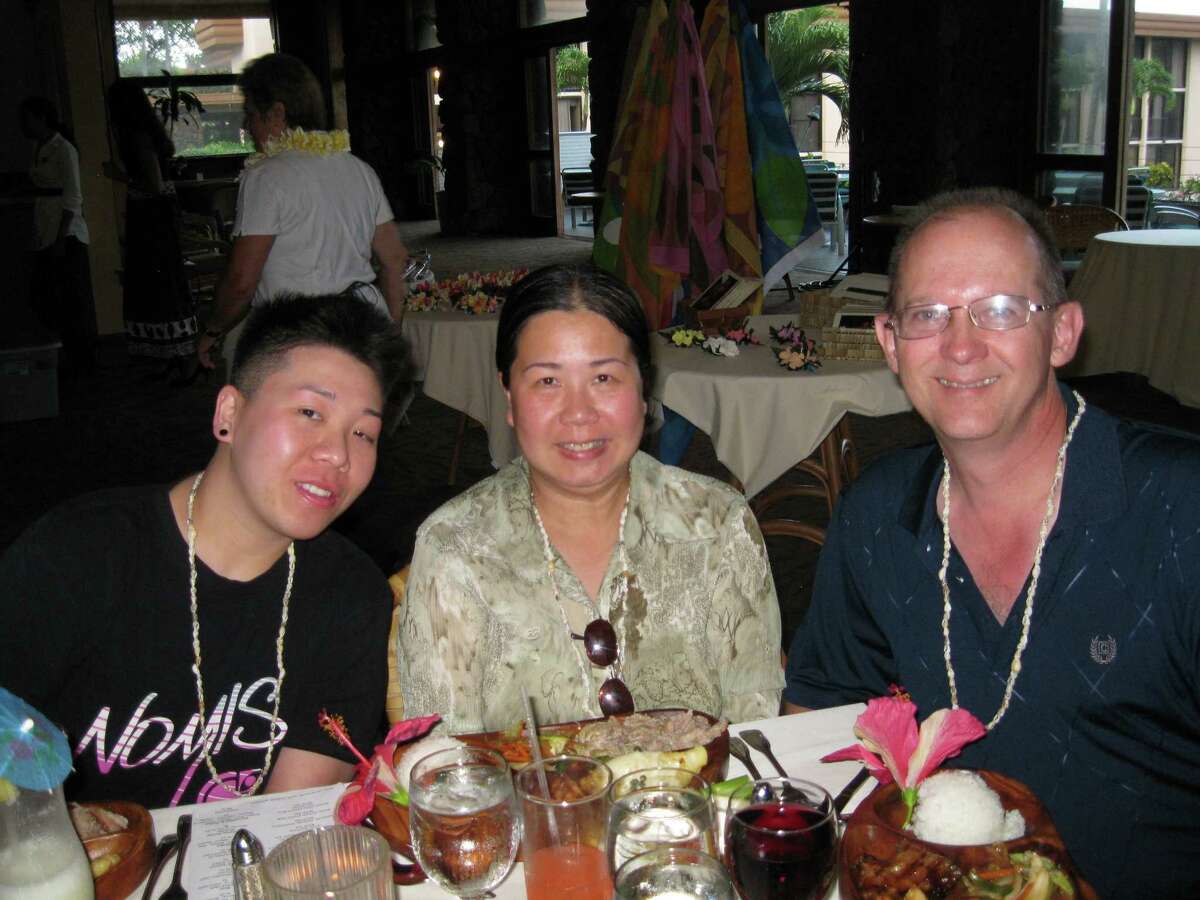 Houston businesswoman Sandy Phan-Gillis, center, seen with her husband Jeff Gillis, right, has been detained by the Chinese government for allegedly being a spy and stealing state secrets. Her husband Jeff Gillis said he is publicizing her ordeal to coincide with the U.S. visit this week of China's President Xi Jinping in hopes of placing pressure on U.S. and Chinese authorities to secure her release.