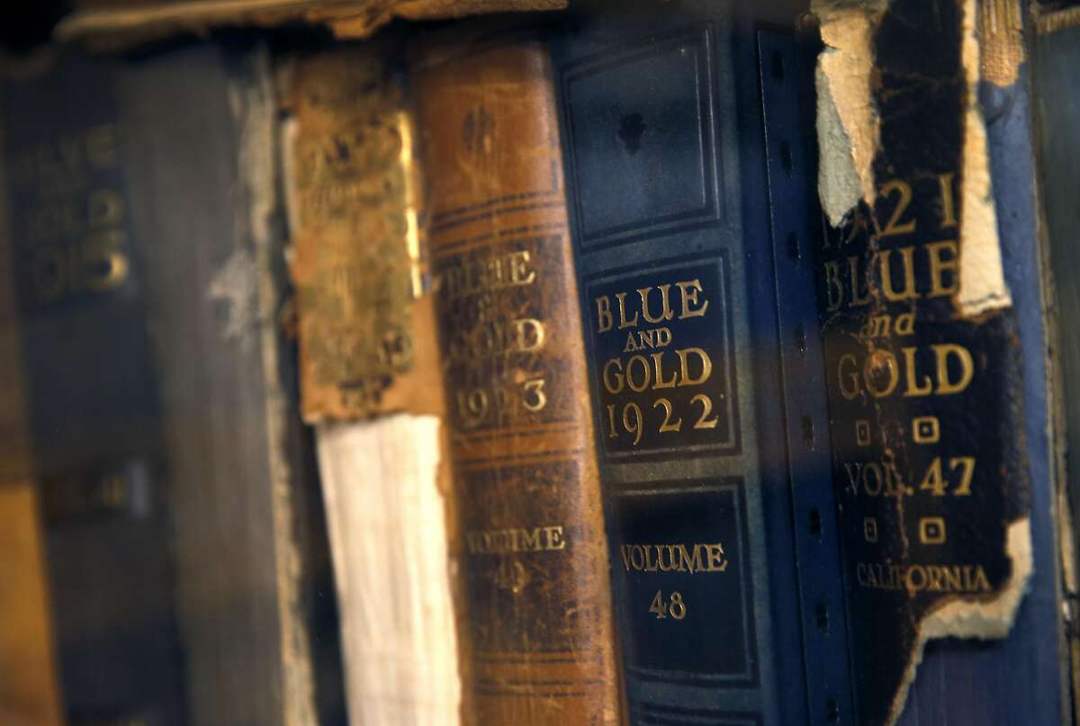 Tattered copies of old Cal yearbooks are displayed in a locked cabinet in the library of Bowles Hall at UC Berkeley on Aug. 27, 2016. The castle-like residence hall underwent a year-long extensive restoration and reopens as a residential college housing as many as 183 undergraduate students.