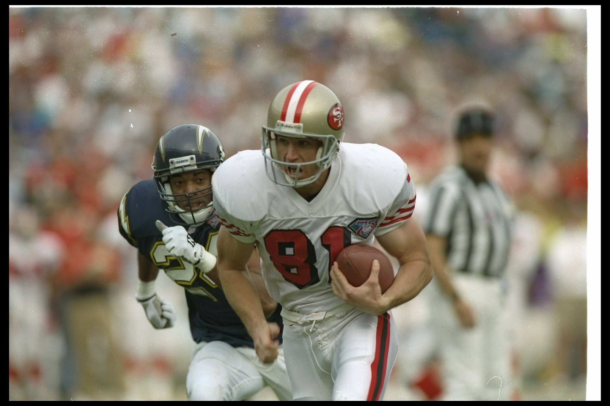 49ers legend Jerry Rice looks ready to take the field again as he dons throwback  jersey 