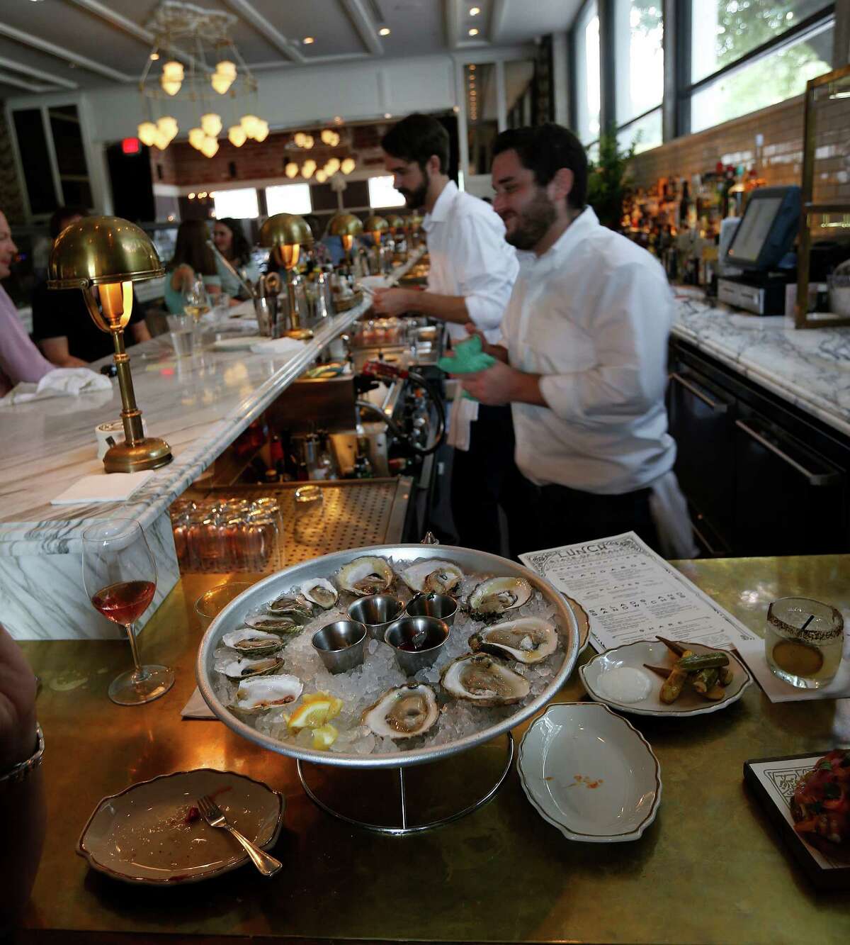 Upscale happy hours riding high in Houston