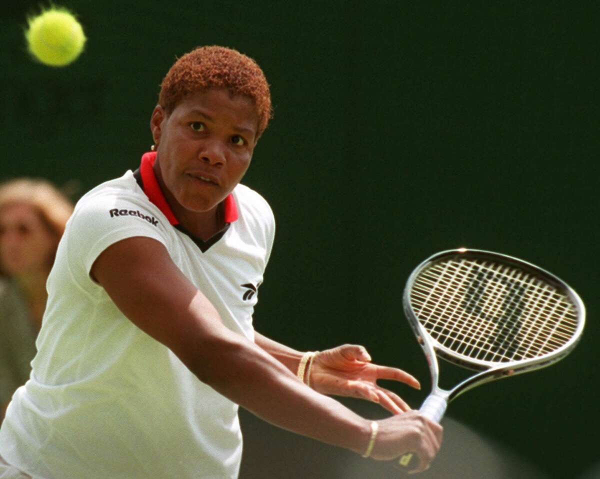 Lori McNeil of the United States plays a return to fellow countrywoman Jennifer Capriati during their Women's Singles match at Wimbledon, Thursday June 25, 1998. (AP Photo/Alastair Grant) HOUCHRON CAPTION (06/26/1998): Houstonian Lori McNeil after her victory over Jennifer Capriati at Wimbledon