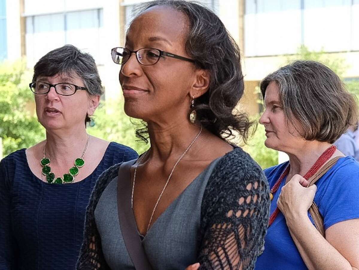 Lisa Moore, left, and fellow University of Texas faculty members Mia Carter and Jennifer Lynn Glass filed suit to at least retain the option of barring guns from their classrooms (Aug. 4, 2016 photo by Rodolfo Gonzalez, Austin American-Statesman).