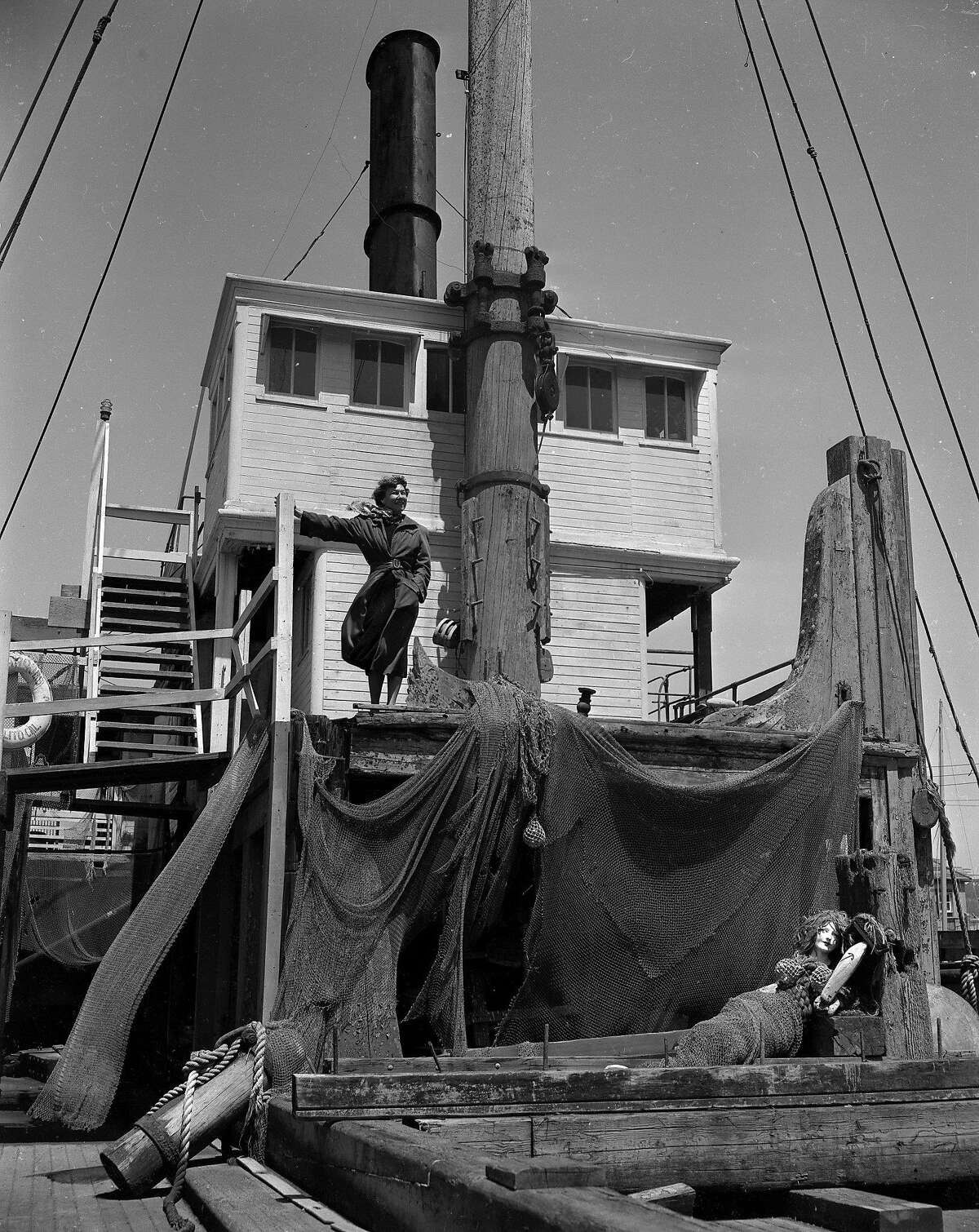 Loyola Fountaine creates modern jewelry, and live on the the Lassen, an old lumber schooner now concerted to house four artists' workshops. It has sat on this spot for 36 years. Photo ran 08/12/1951
