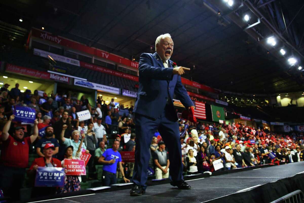 Washington State Republican Senator Don Benton greets the crowd after speaking during a rally for Republican Presidential candidate Donald Trump, Tuesday, Aug. 30, 2016 at Xfinity Arena in Everett.