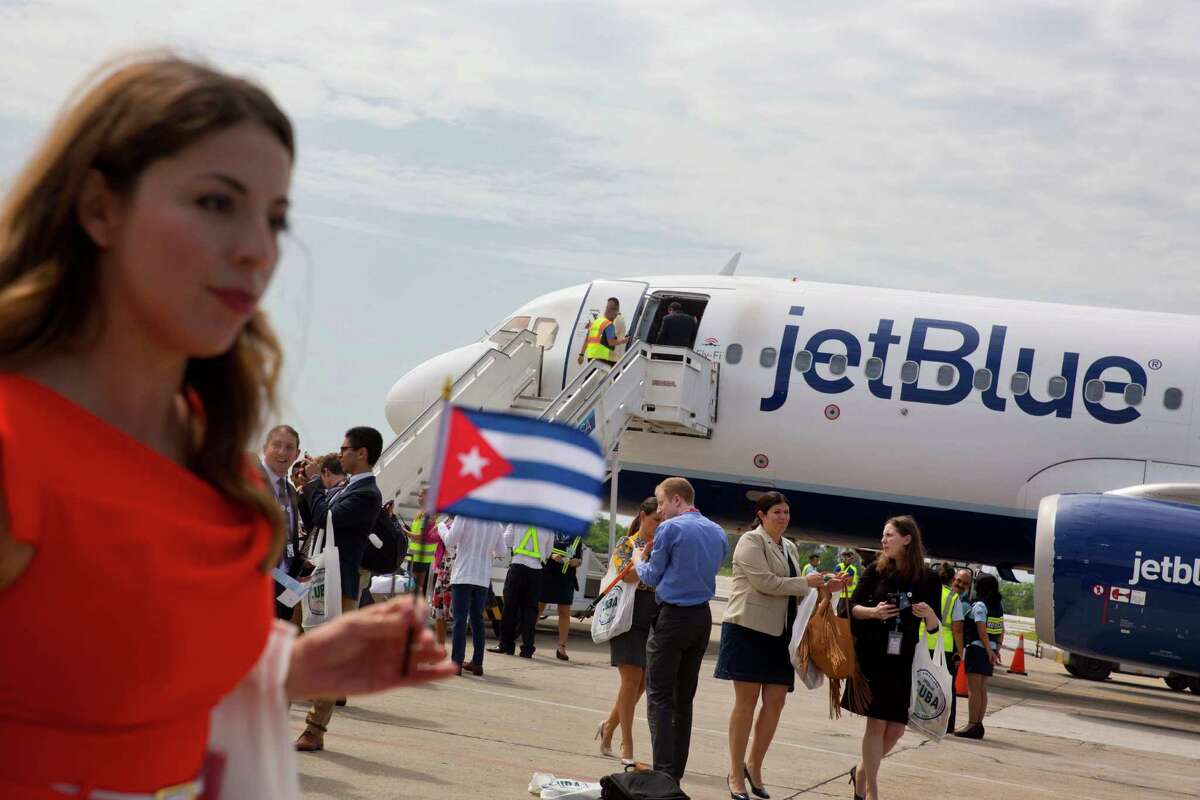 Passengers of JetBlue flight 387 arrive at the airport in Santa Clara, Cuba, on Wednesday. (AP Photo/Ramon Espinosa)