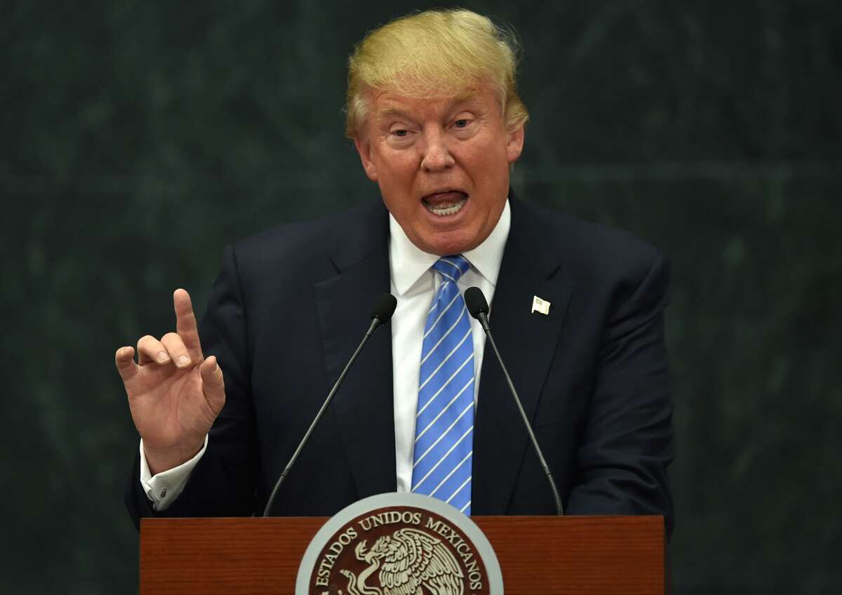 US presidential candidate Donald Trump delivers a joint press conference with Mexican President Enrique Pena Nieto (out of frame) in Mexico City on August 31, 2016. Donald Trump was expected in Mexico Wednesday to meet its president, in a move aimed at showing that despite the Republican White House hopeful's hardline opposition to illegal immigration he is no close-minded xenophobe. Trump stunned the political establishment when he announced late Tuesday that he was making the surprise trip south of the border to meet with President Enrique Pena Nieto, a sharp Trump critic.