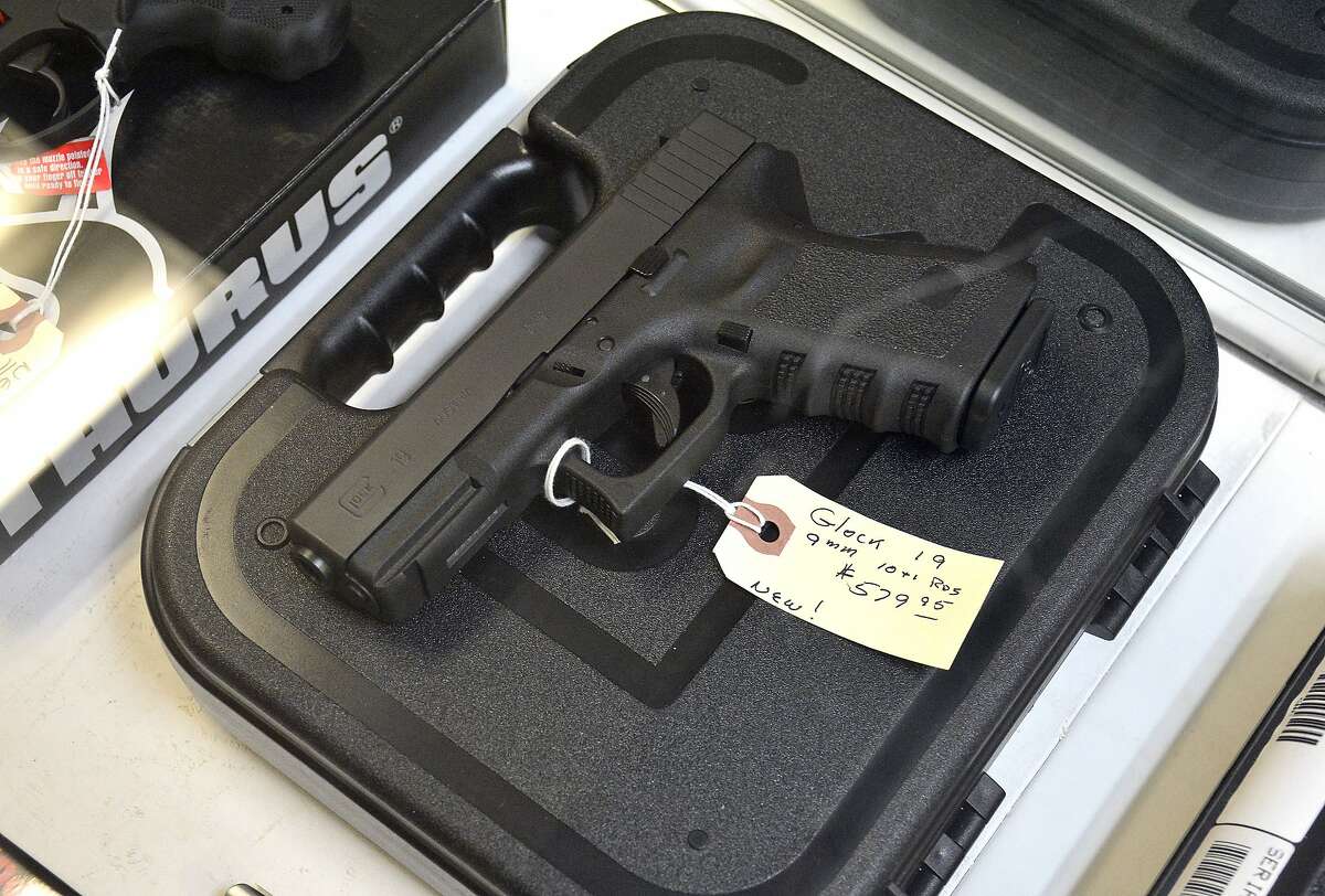 This Friday, May 6, 2016 photo shows a Glock 19 at Jim's Gun Shop on Farmington Avenue in Bristol, Conn. Owner Jim Zoppi has seen an the increase in requests for pistol permits. (Mike Orazzi/The Bristol Press via AP) MANDATORY CREDIT