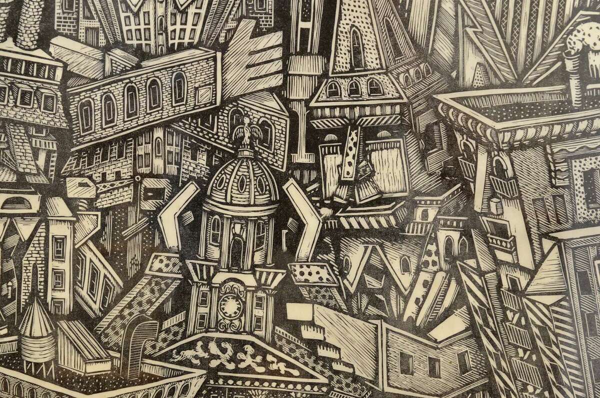 Wood carving prints on display in Norwalk