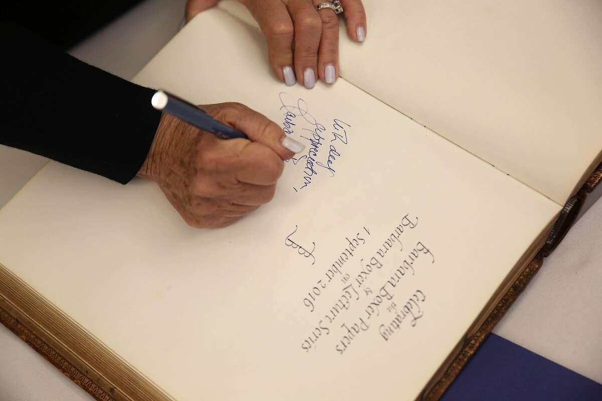 Senator Barbara Boxer signs the original guest book of Hubert Howe Bancroft at UC Berkeley's Bancroft Library on Thursday, September 1, 2016 in Berkeley, California.