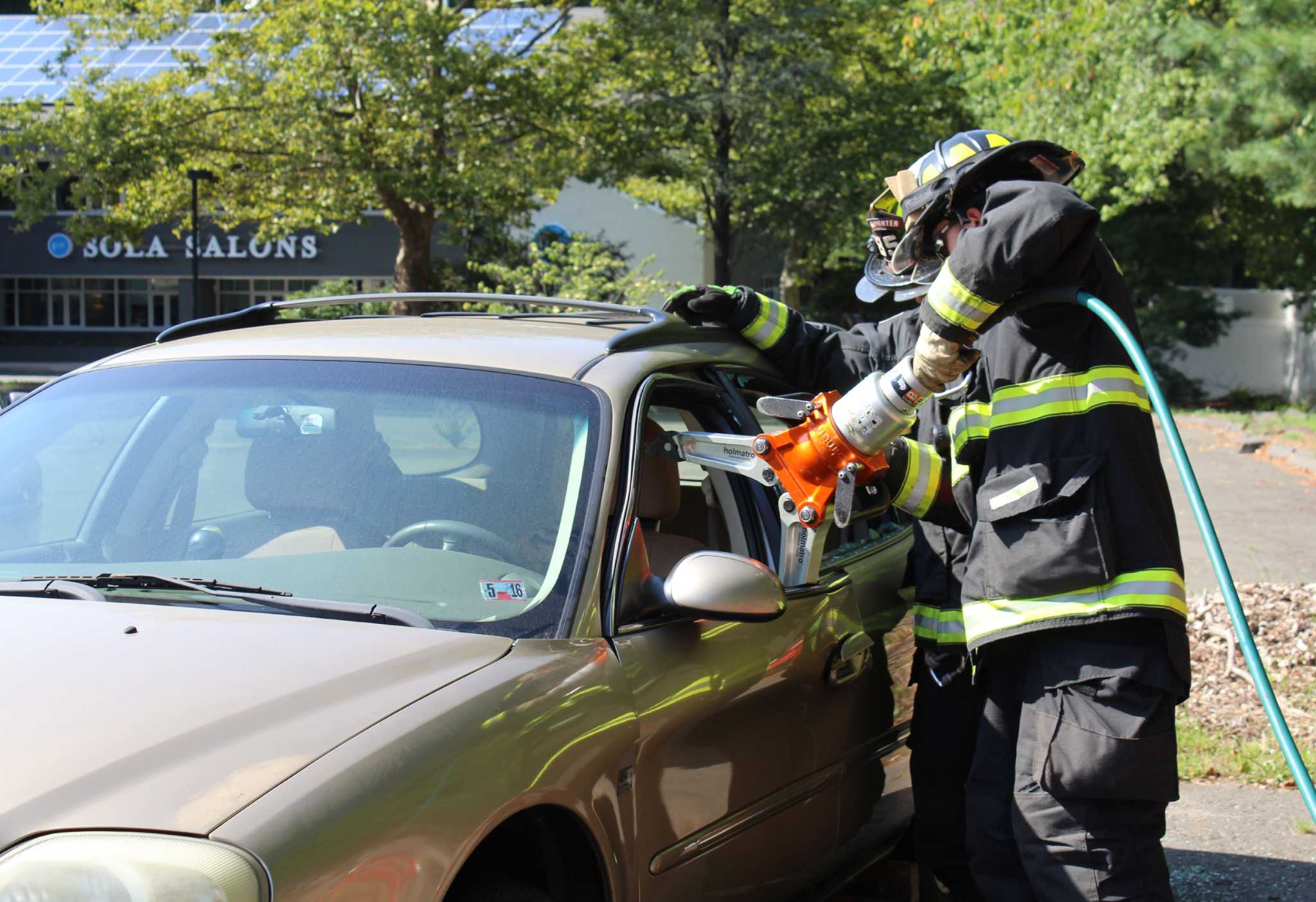 Firefighters practice car accident rescues