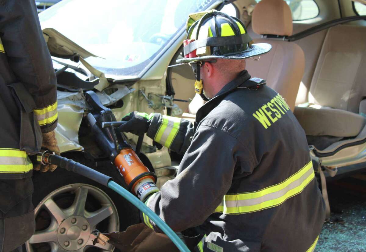 Firefighters practice car accident rescues