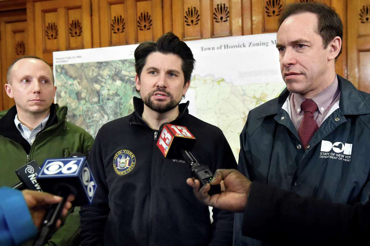 State Operations Director Jim Malatras, center, speaks during a news conference on Saturday, Feb. 13, 2016, at HAYC3 Armory in Hoosick Falls, N.Y. Joining him are DEC Acting Commissioner Basil Seggos, left, and DOH Commissioner Howard Zucker. (Cindy Schultz / Times Union)