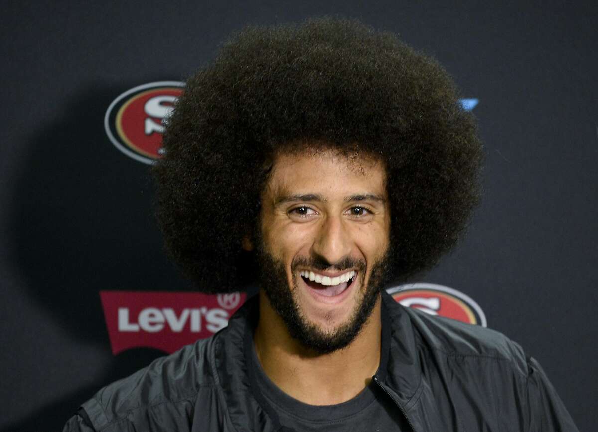 San Francisco 49ers quarterback Colin Kaepernick talks to the media at a news conference an NFL preseason football game against the San Diego Chargers on Sept. 1 in San Diego. 