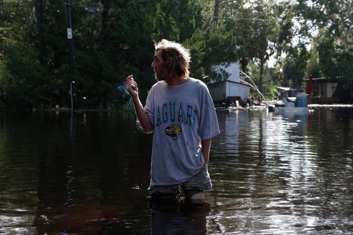 A resident surveys damage around his home from high winds and storm surge associated with Hurricane Hermine which made landfall overnight in the area on September 2, 2016 in St. Marks, Florida. Hermine made landfall as a Category 1 hurricane but has weakened back to a tropical storm. (Photo by Brian Blanco/Getty Images)