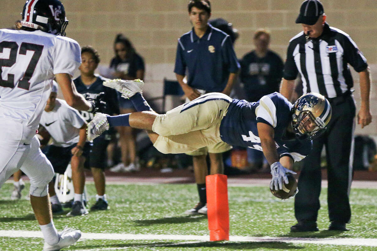 O'Connor's Shawn Jasso leaps across the goal line on a 6-yard touchdown reception during the first half of their game with Churchill at Farris Stadium on Friday, Sept. 2, 2016. MARVIN PFEIFFER/ mpfeiffer@express-news.net