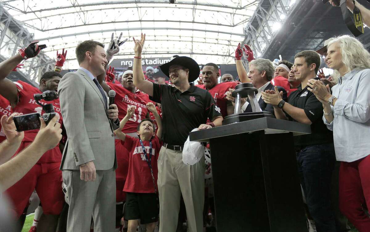 Houston Cougars head coach Tom Herman celebrates after the team's 33-23 win over Oklahoma Sooners in the Advocare Texas Kickoff on Saturday, Sept. 3, 2016, at NRG Stadium in Houston.