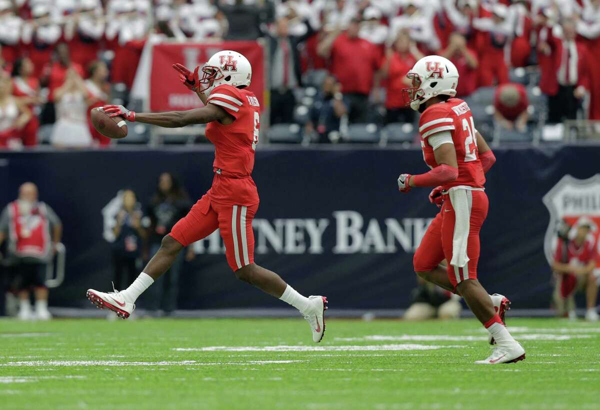 Houston Cougars cornerback Howard Wilson (6) celebrates with Houston Cougars safety Garrett Davis (1) after Wilson recovered a fumble against Oklahoma Sooners on Saturday, Sept. 3, 2016, at NRG Stadium in Houston.