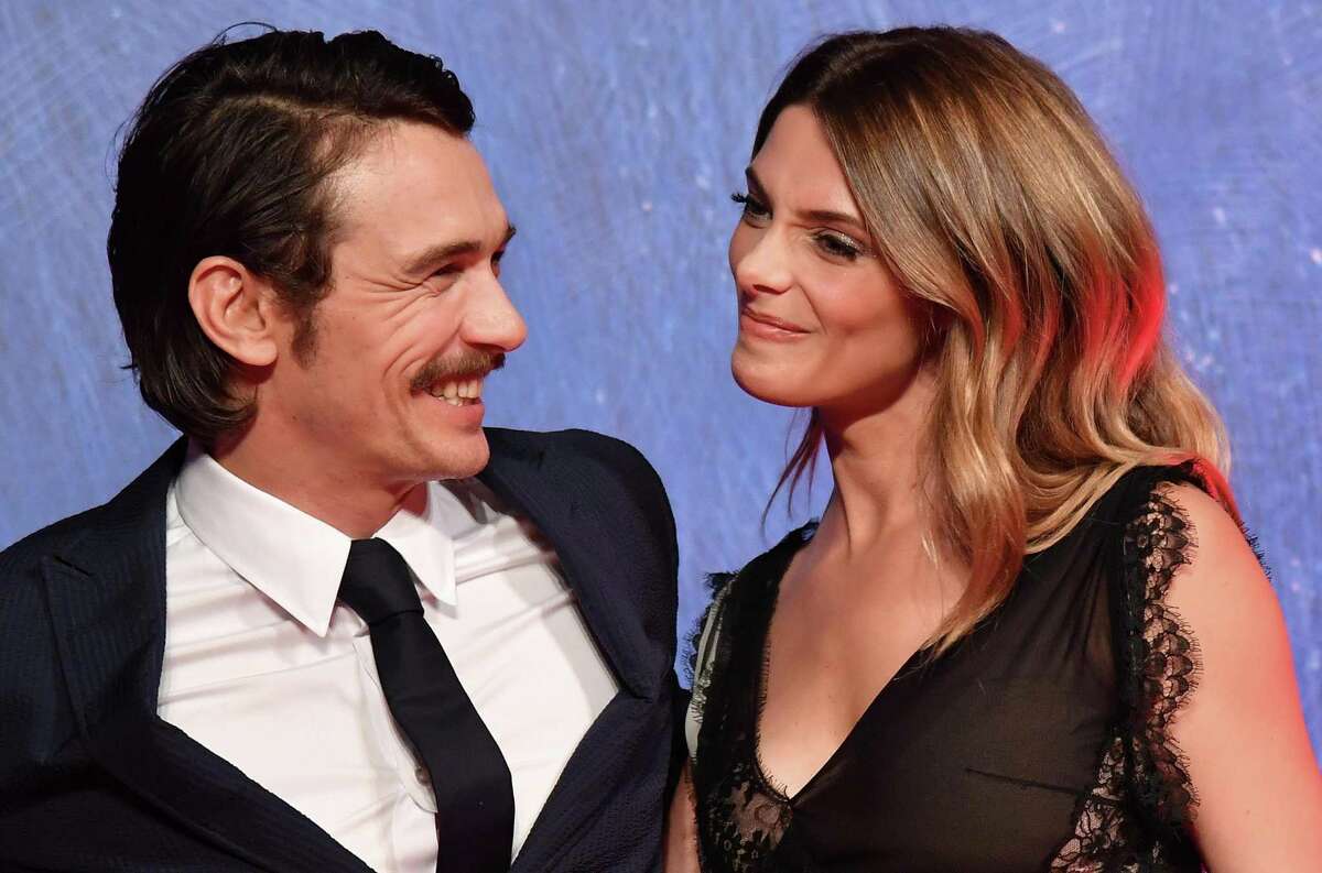 US director and actor James Franco and actress Ashley Greene arrive on the red carpet for ''In Dubious Battle'' at the Venice Film Festival in Venice, Italy, Saturday, Sept. 3, 2016. (Ettore Ferrari/ANSA via AP) ORG XMIT: VEN144