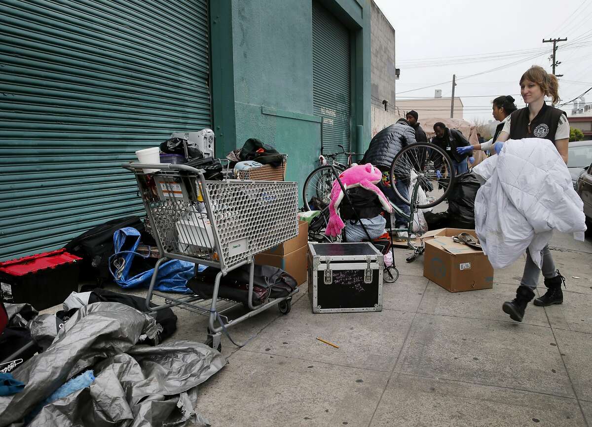 Hot team members helped clear out an encampment on Shotwell Street Monday April 20, 2015. A homeless encampment near the corner of 16th Street and Shotwell in San Francisco, Calif. was dismantled and the people moved to the new navigation center a few blocks away.